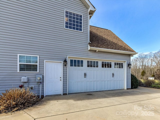 exterior space featuring a garage