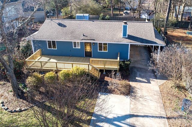 view of front facade with a wooden deck