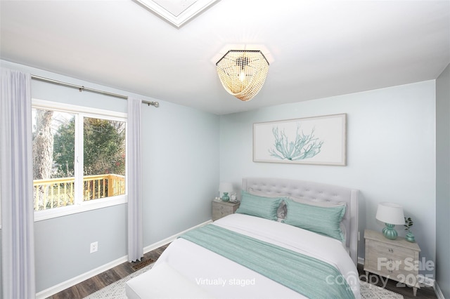 bedroom featuring dark hardwood / wood-style flooring