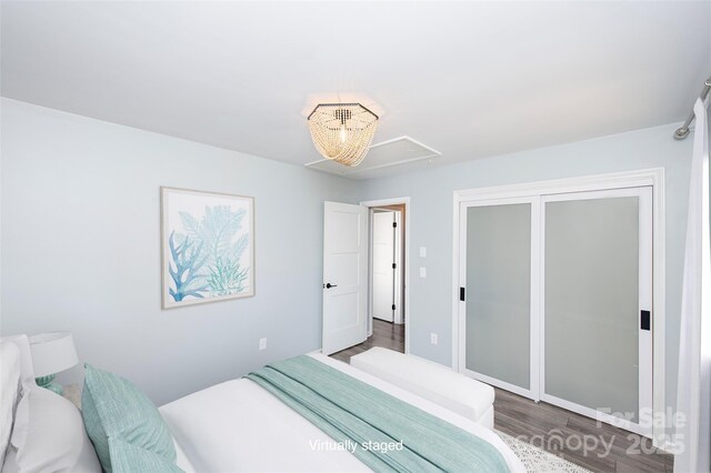 bedroom featuring dark wood-type flooring