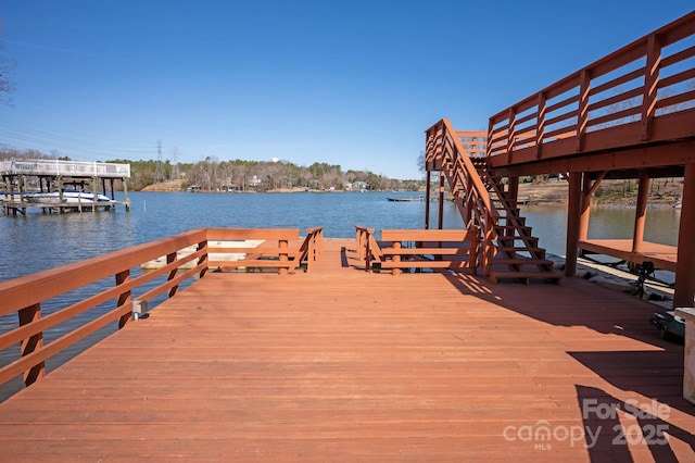 view of dock with a water view