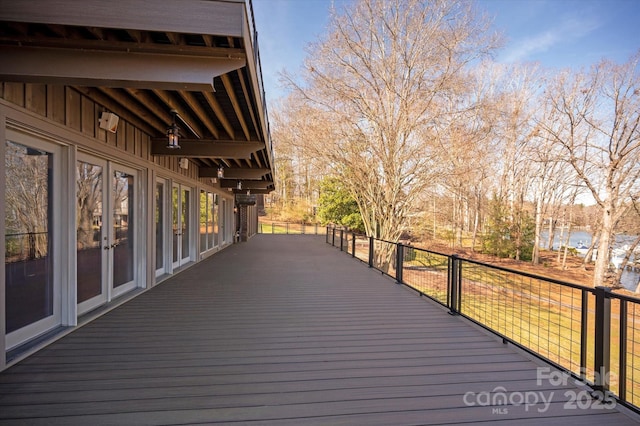 wooden terrace featuring french doors