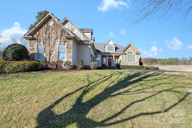 front facade featuring a front yard