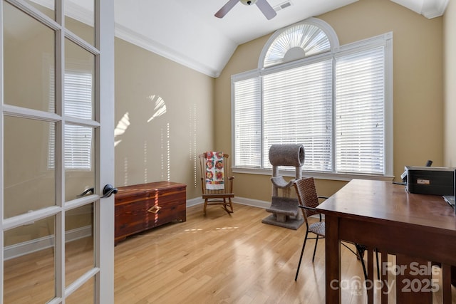 office area with french doors, vaulted ceiling, ceiling fan, and light hardwood / wood-style flooring