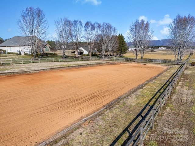 view of home's community with a rural view and a mountain view