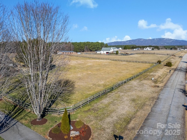 bird's eye view with a rural view and a mountain view