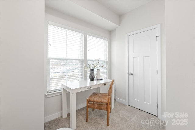 office area with light colored carpet