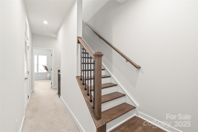 stairway with carpet floors