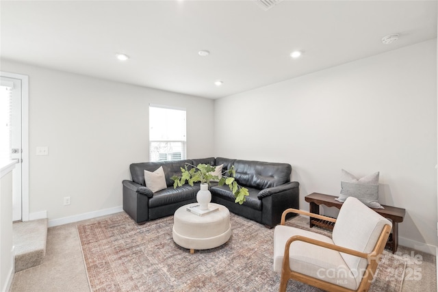 living room featuring light colored carpet