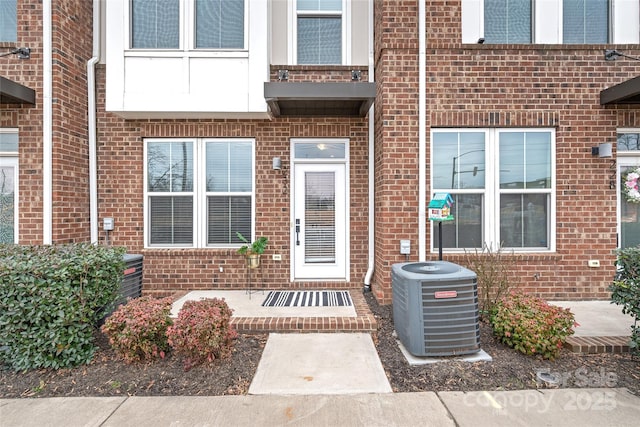 property entrance featuring cooling unit