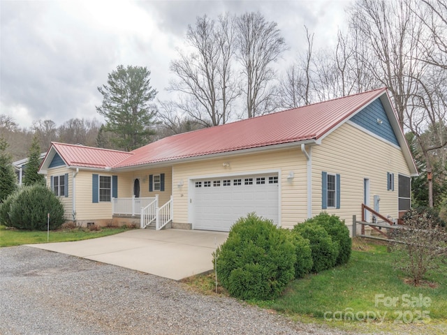 ranch-style house featuring a garage