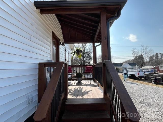 wooden deck featuring covered porch