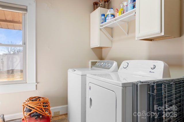 laundry room with cabinets and independent washer and dryer