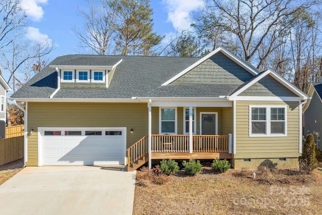 view of front of home with a garage and covered porch