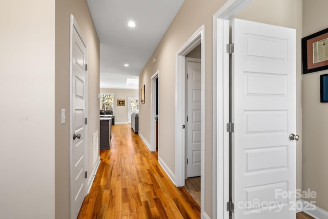 hall featuring hardwood / wood-style flooring