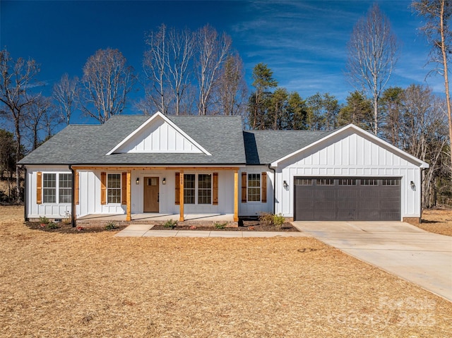 modern farmhouse style home featuring a porch and a garage