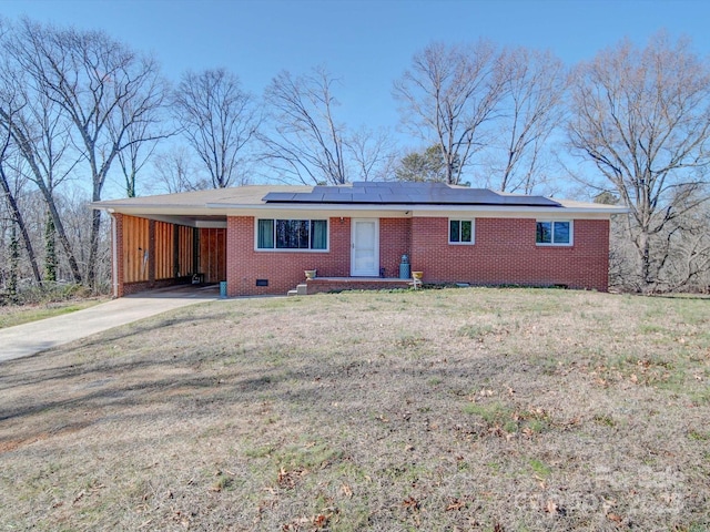 single story home featuring a carport and a front lawn