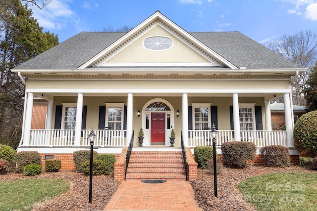 view of front of home featuring covered porch