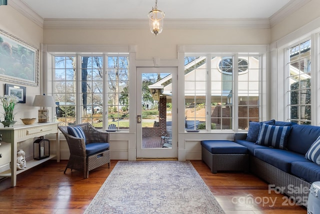 sunroom / solarium featuring a healthy amount of sunlight