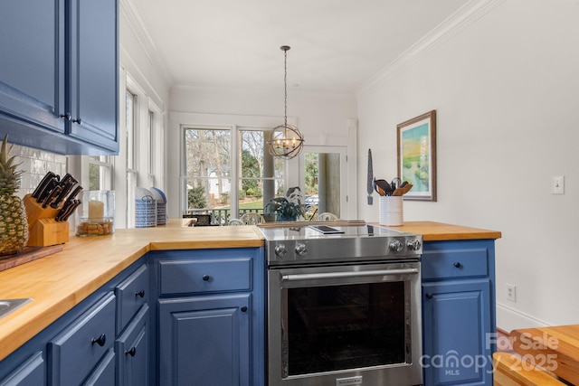 kitchen with blue cabinets, butcher block countertops, pendant lighting, and high end range