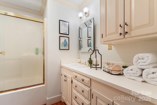 bathroom featuring vanity, crown molding, and shower / bath combination with glass door