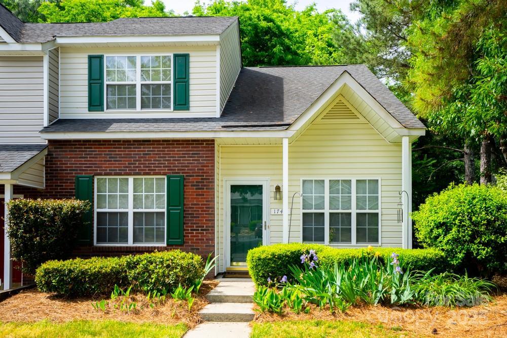 1748 Pergola Pl, Charlotte, NC 28213 - view of front of property featuring brick siding and roof with shingles