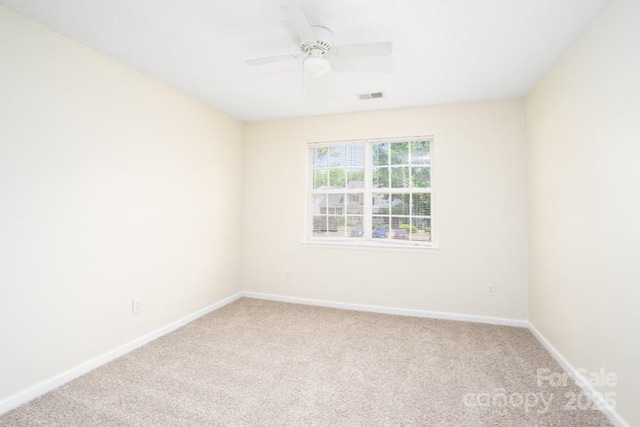 1748 Pergola Pl, Charlotte, NC 28213 - carpeted empty room featuring baseboards, ceiling fan, and visible vents