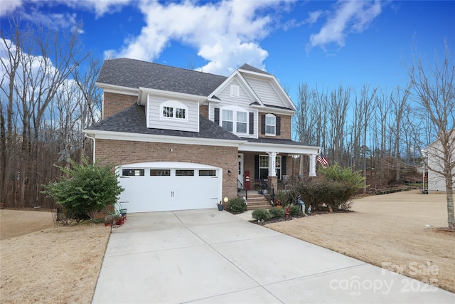 craftsman-style house featuring a porch and a garage