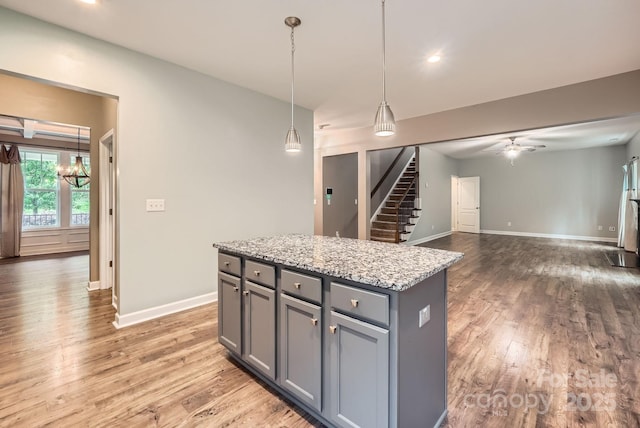 2864 Park Ridge Blvd, Rock Hill, SC 29732 - kitchen featuring gray cabinetry, light wood-type flooring, baseboards, a chandelier, and recessed lighting
