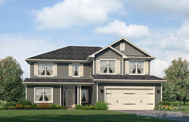 view of front of home featuring a garage and a front lawn