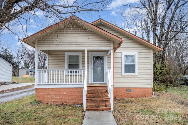 bungalow-style house with covered porch