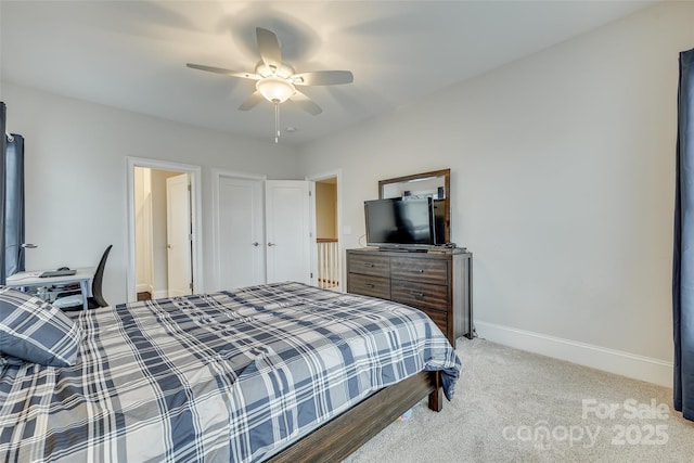 bedroom featuring light carpet and ceiling fan