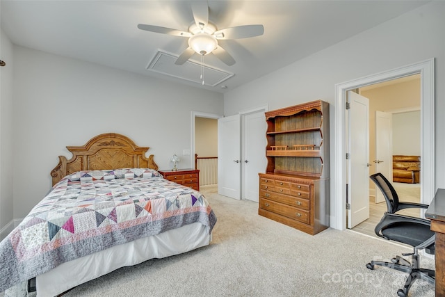 carpeted bedroom with ceiling fan