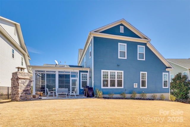 520 Crawfish Dr, Fort Mill, SC 29708 - rear view of property featuring a yard, a patio area, and a sunroom