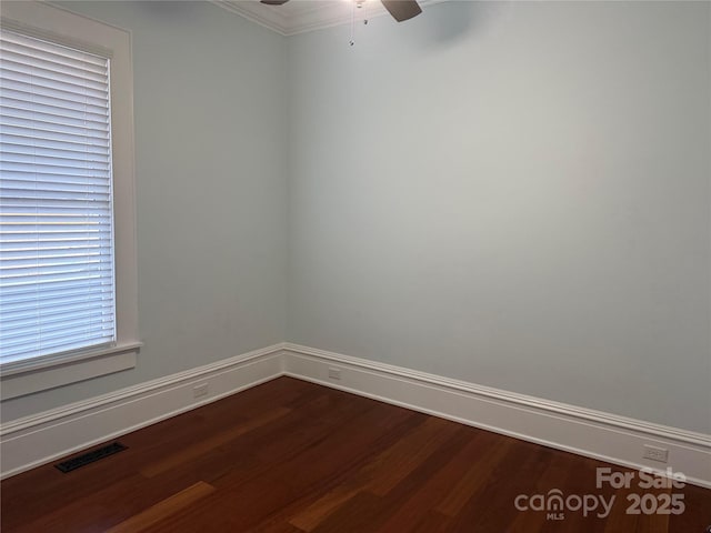 empty room with wood-type flooring and ceiling fan