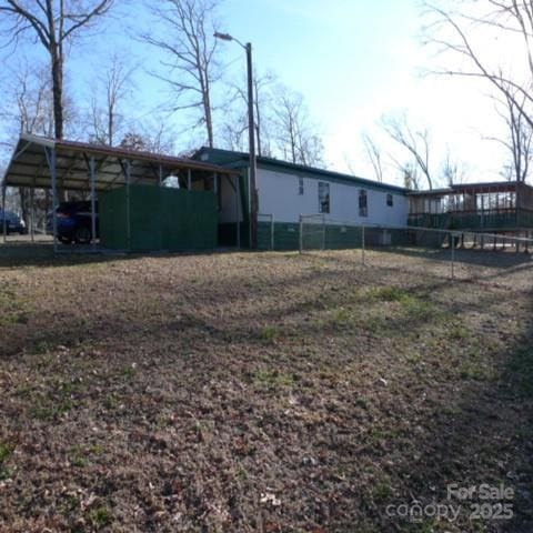 view of yard featuring a carport