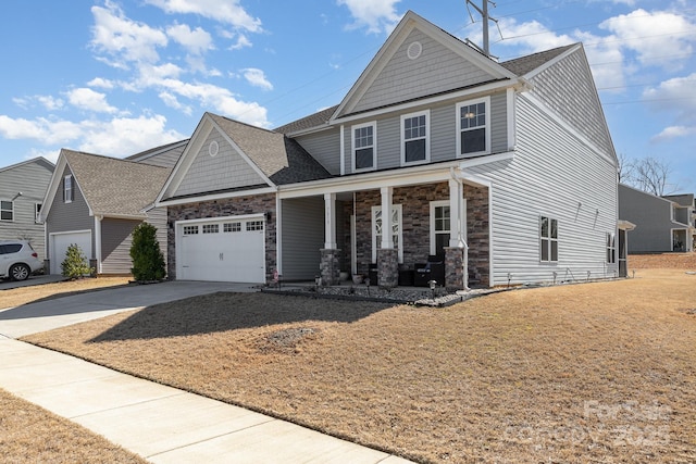 view of front of property featuring covered porch, stone siding, concrete driveway, and an attached garage