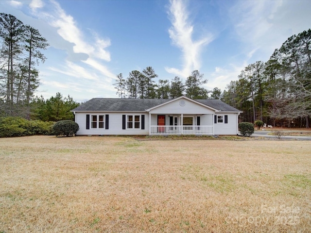 ranch-style home featuring a front yard and a porch