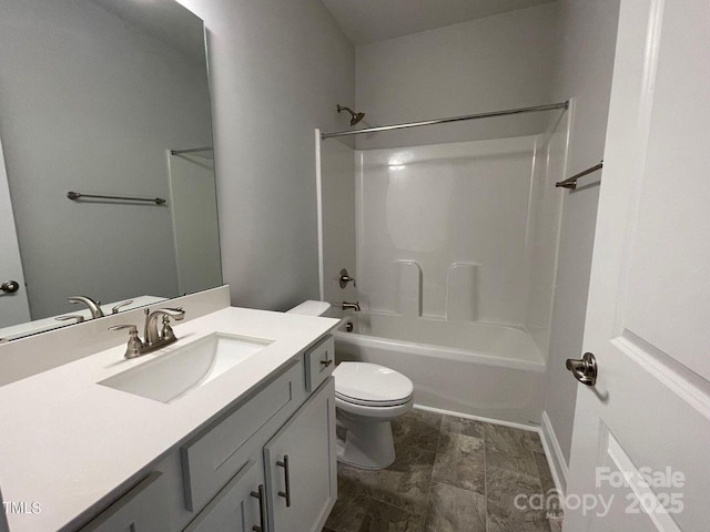 full bathroom with vanity,  shower combination, and toilet