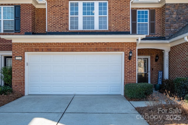 property entrance with a garage