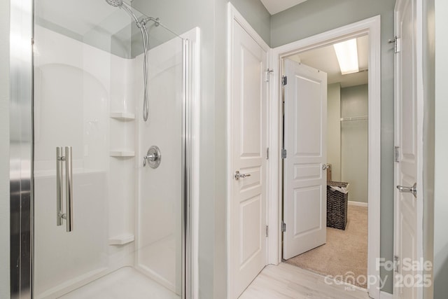 bathroom featuring walk in shower