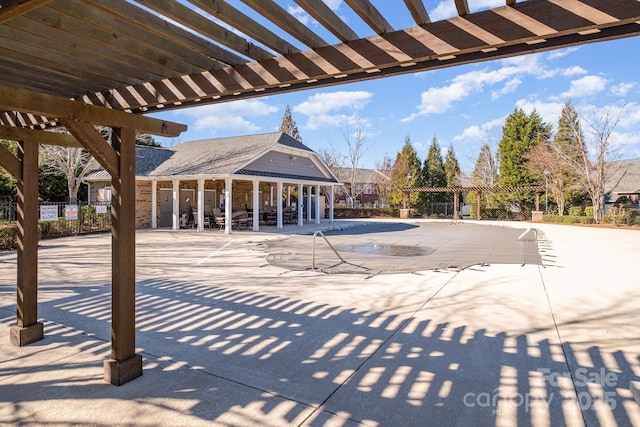 view of pool featuring a pergola and a patio