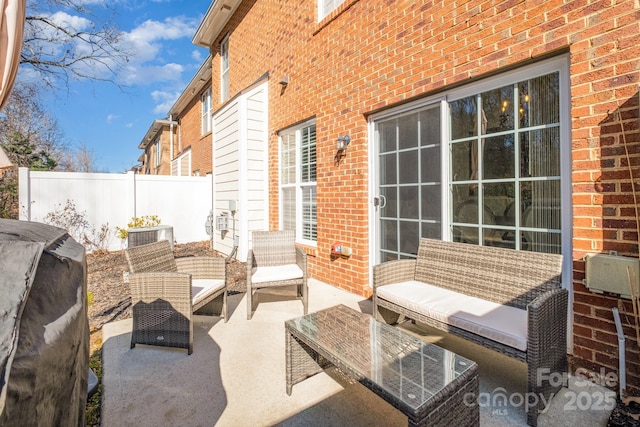 view of patio featuring outdoor lounge area and area for grilling