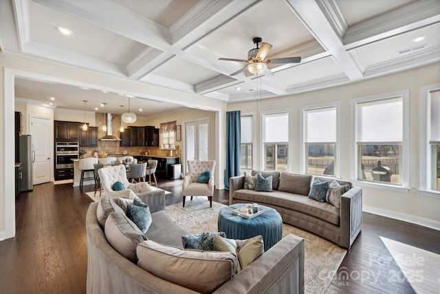 living room with coffered ceiling, beam ceiling, crown molding, and dark hardwood / wood-style floors