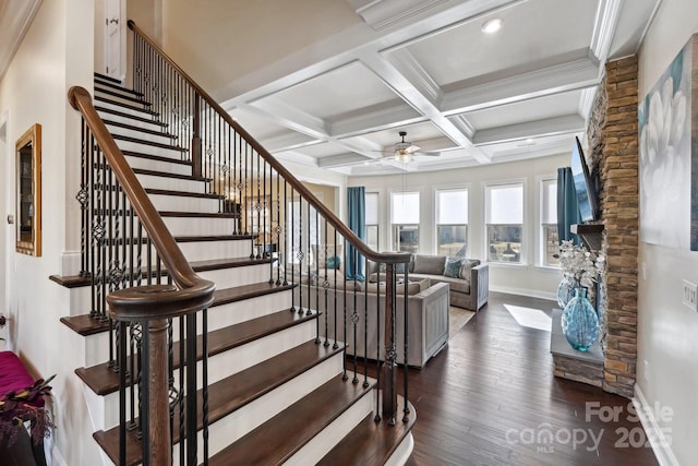 stairs with hardwood / wood-style flooring, ceiling fan, coffered ceiling, and beam ceiling