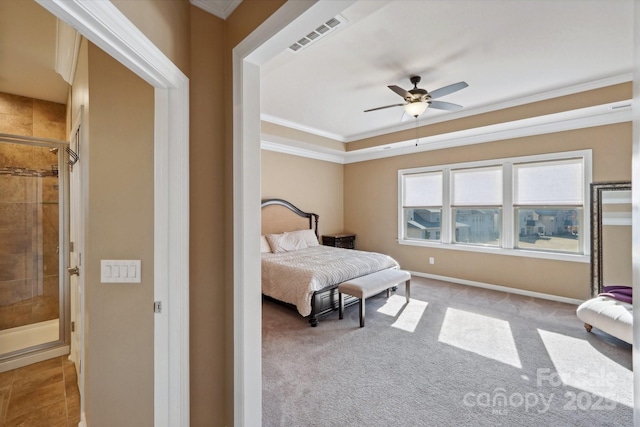 bedroom featuring ornamental molding, light carpet, and ceiling fan