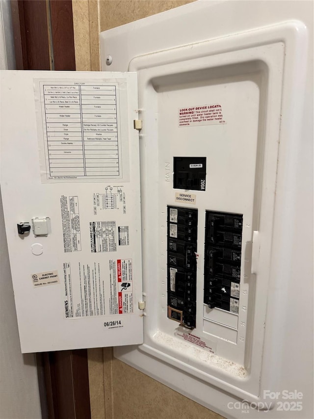 utility room featuring electric panel