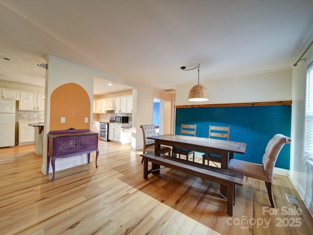 dining area featuring light hardwood / wood-style flooring