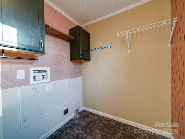 washroom with washer hookup, crown molding, cabinets, and a textured ceiling