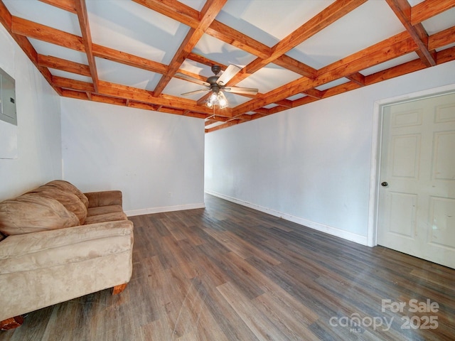 living area with coffered ceiling, beamed ceiling, dark hardwood / wood-style floors, and ceiling fan